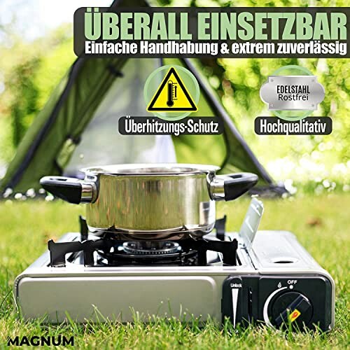 Tragbarer Gasherd mit Topf vor Zelt im Freien